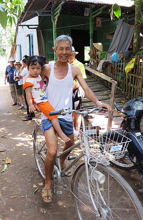 Grandfather and granddaughter in Tan Chau