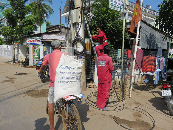 Utility workers in Tan Chau