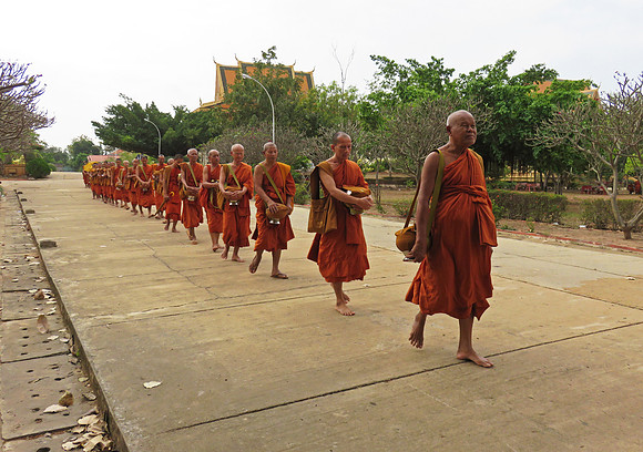 Buddhist monks walking to lunch at the Oudong Buddhist monastery