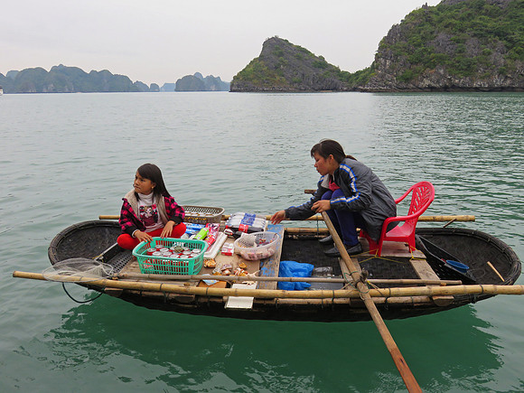 Selling wares in Ha Long Bay, Vietnam
