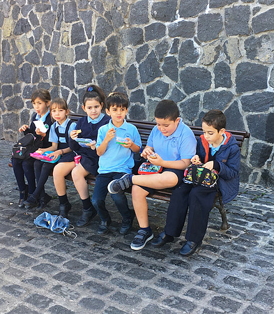 School children on lunch break in Puerta de la Cruz, Tenerife, Canary Islands
